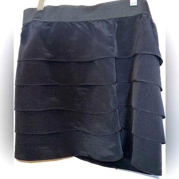 Aqua Dresses & Skirts - Aqua silky feel ruffled black miniskirt! Worn 1x!